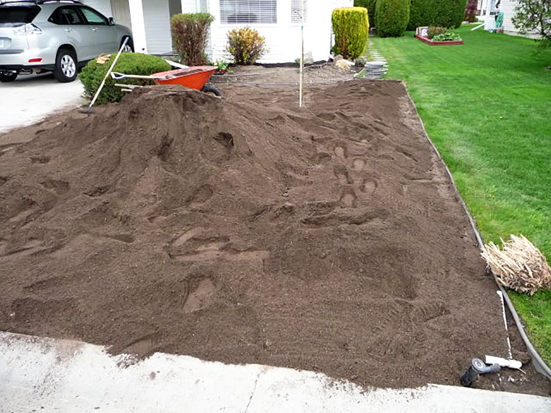 New Soil Adding new soil to the xeriscape project