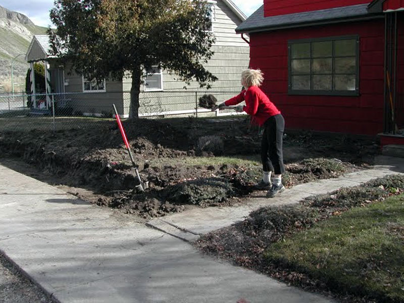 Xeriscape digging Saskia getting to work on her xeriscape project